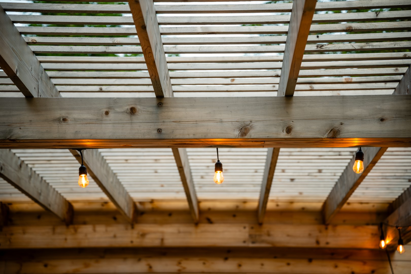 Internal roof with exposed lighting for Pergola, attached to pool house in Moncton