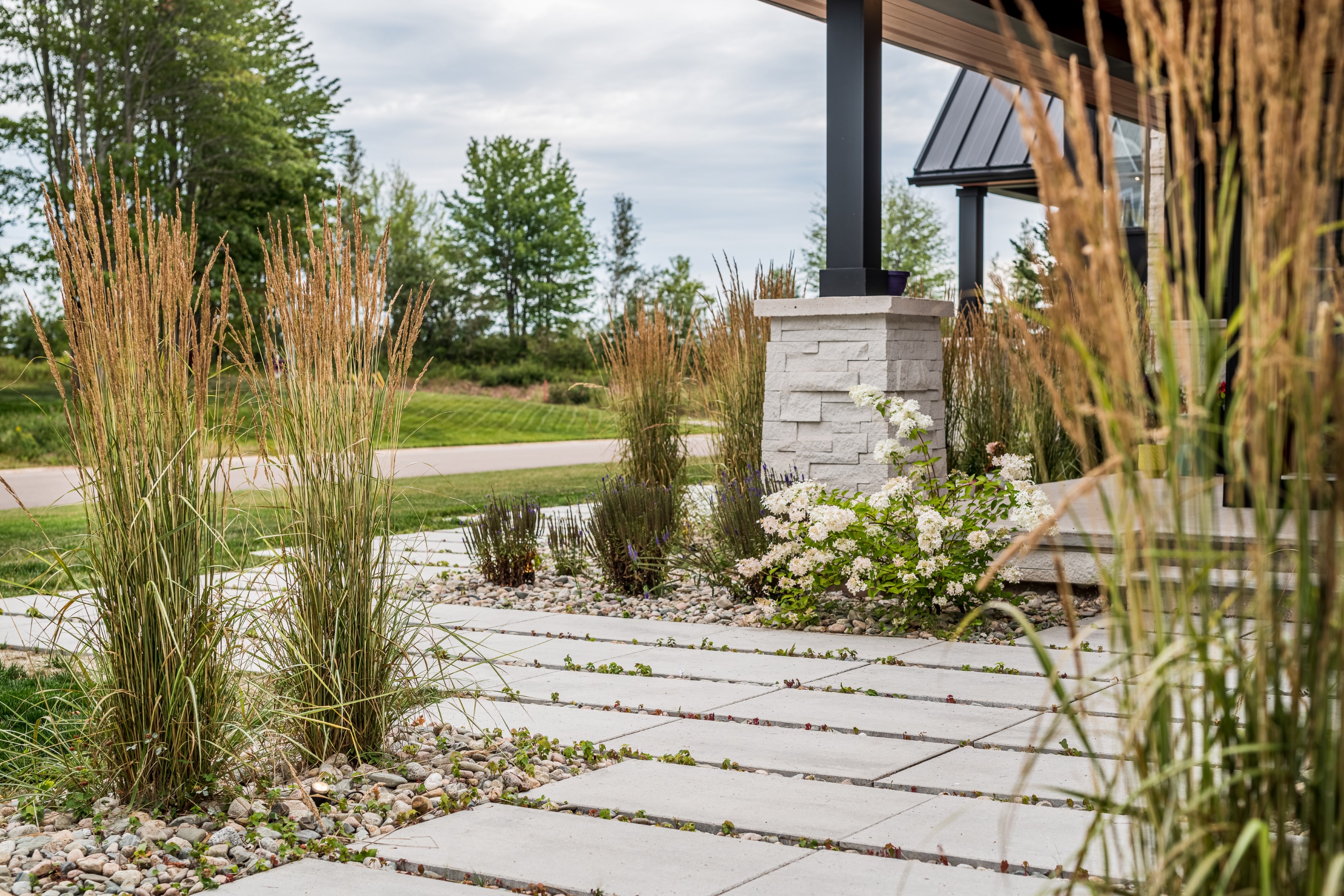 Front walkway showing patio work relating to chalet upgrades in New Brunswick