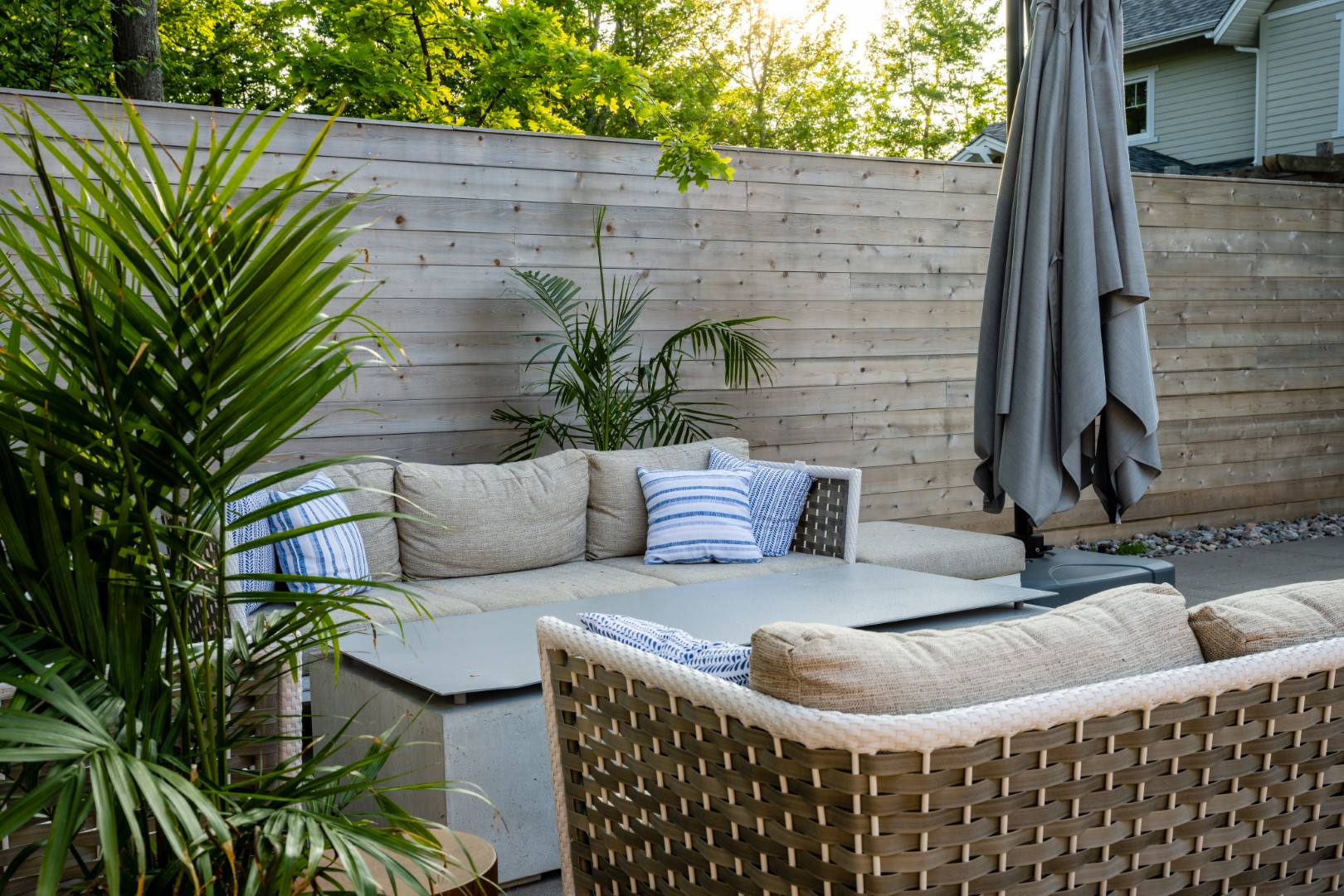 Seating Area next to home swimming pool installation in Moncton back garden