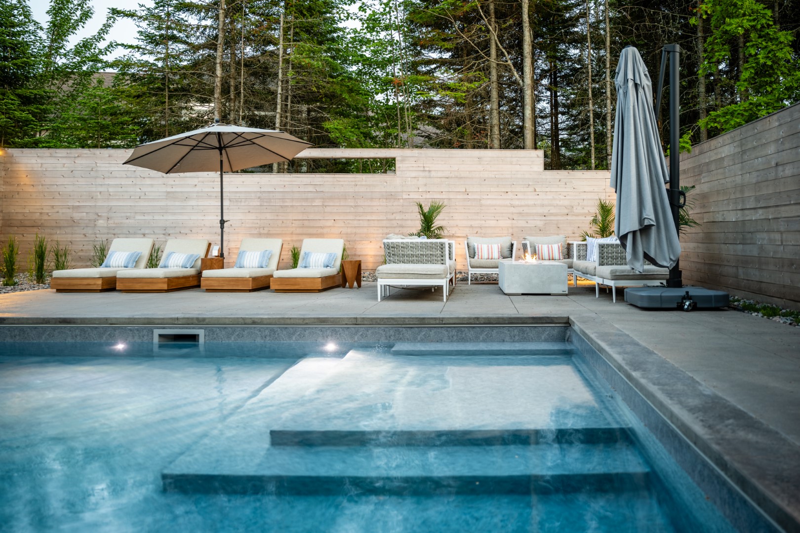 Tanning ledge closeup in daytime as part of Moncton home swimming pool installation