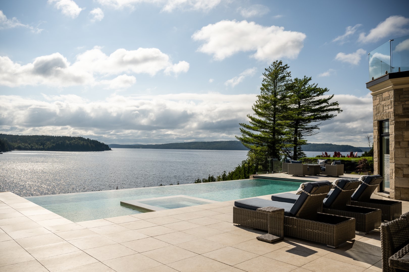 St John installation of vanishing edge pool, hot tub, tanning ledge, and lower catch basin