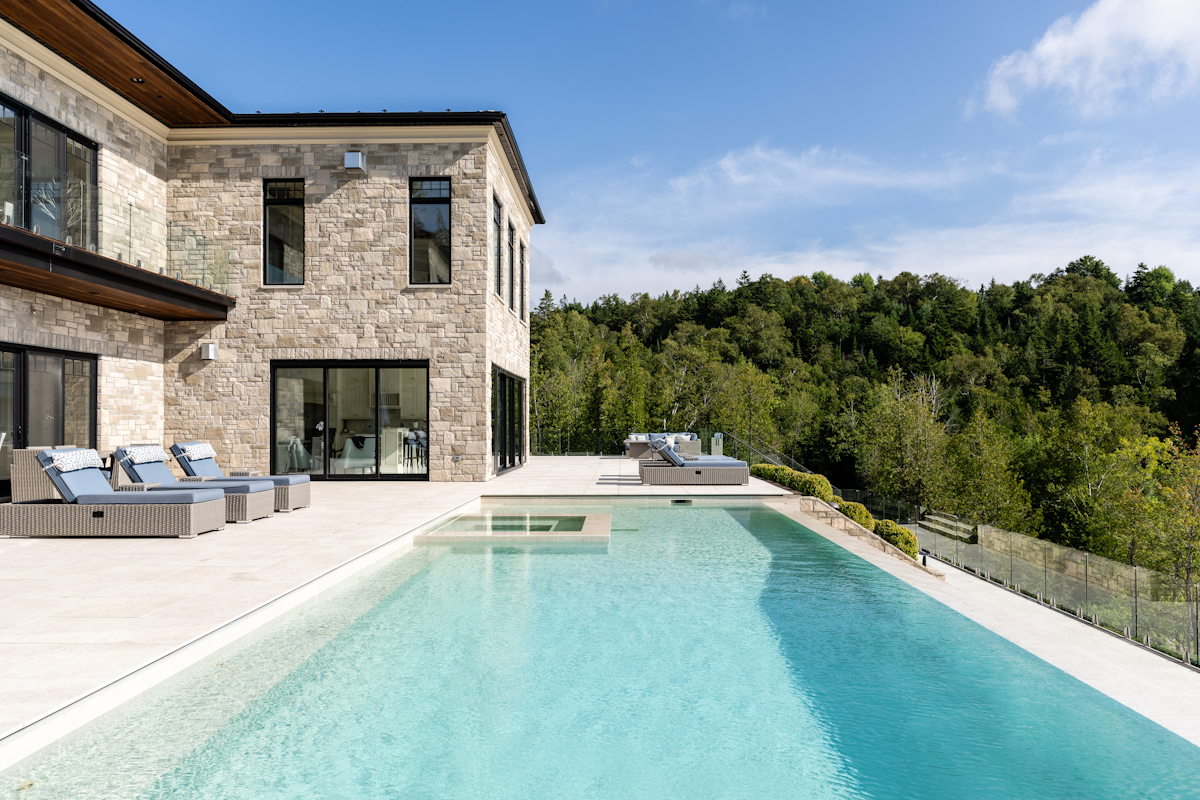 Clean and clear pool water in outdoor swimming pool.