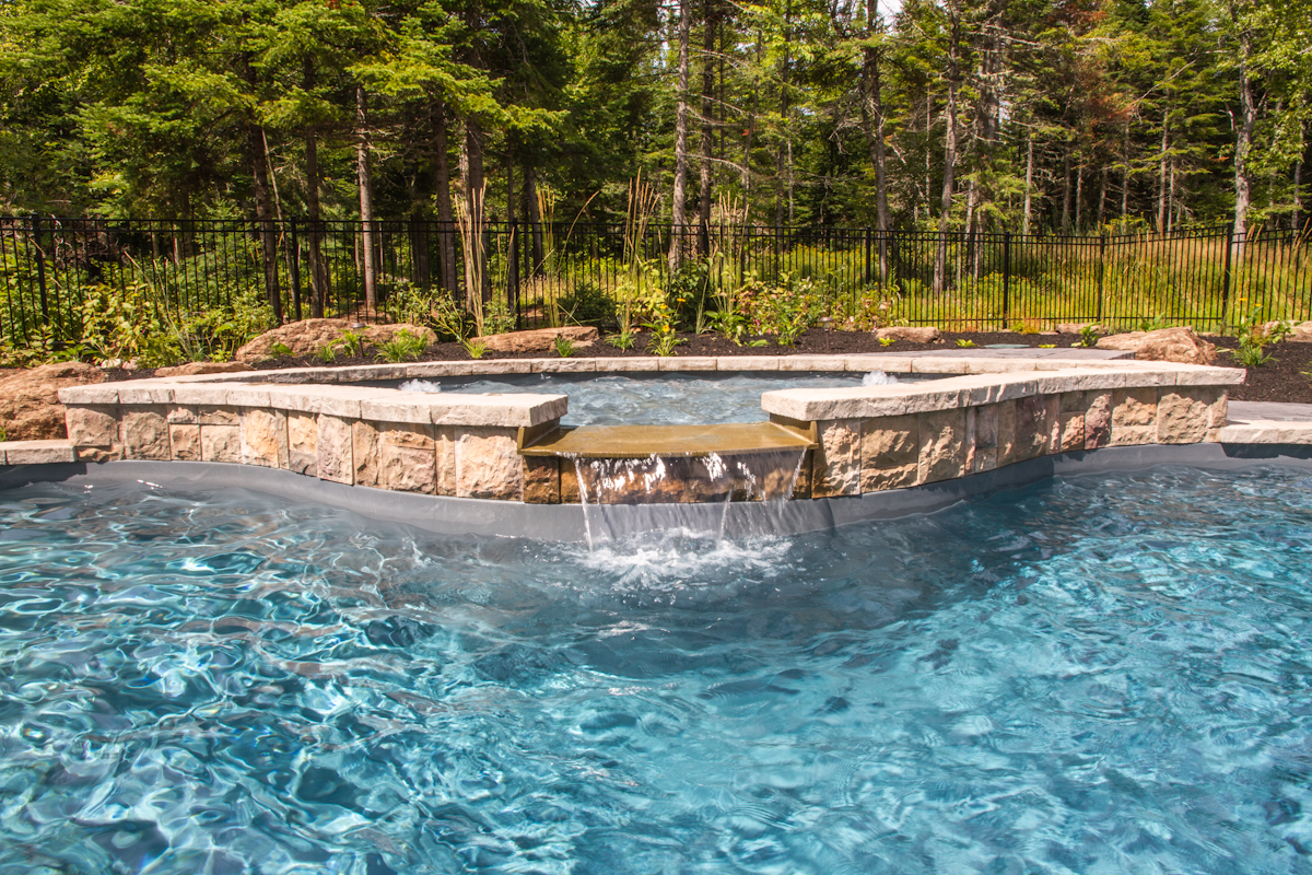 Crystal-clear backyard swimming pool waters in Irishtown, NB